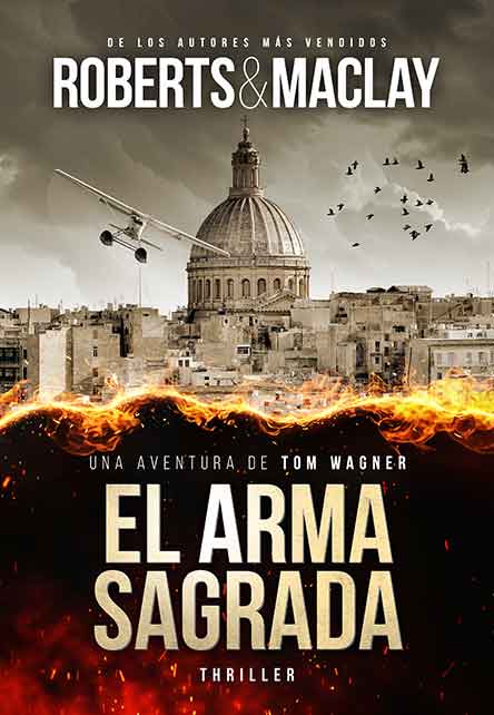 Buchumschlag für El Arma Sagrada von Roberts & Maclay, der eine Stadtlandschaft mit einem großen Kuppelgebäude, darüber fliegenden Vögeln, einem Hubschrauber und Flammen am unteren Rand zeigt. Der Text weist darauf hin, dass es sich um einen Thriller handelt.